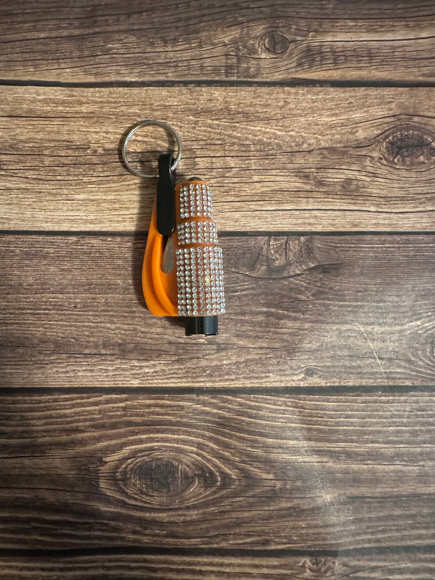 Orange and silver rhinestone seatbelt cutter/ window breaker