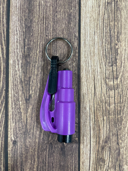 Purple seatbelt cutter/ window breaker