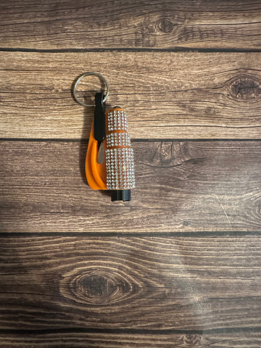 Orange and silver rhinestone seatbelt cutter/ window breaker